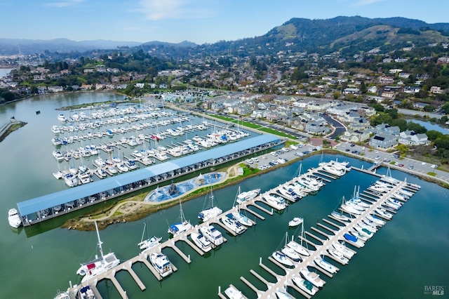 bird's eye view featuring a water and mountain view