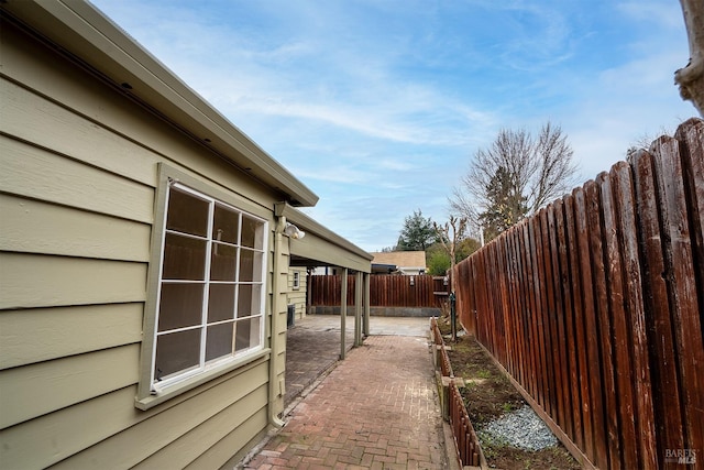 view of home's exterior with a patio area