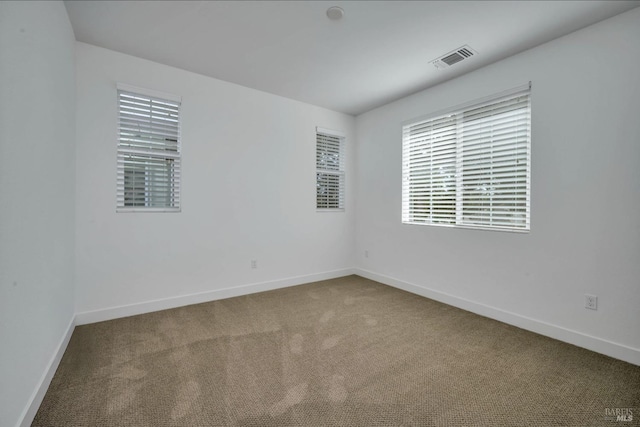 view of carpeted spare room