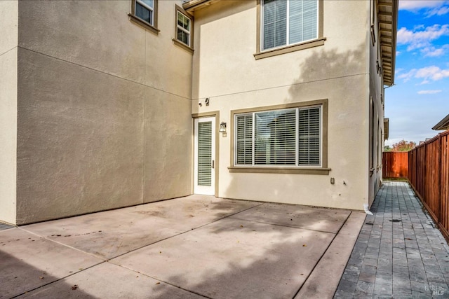 rear view of house with a patio area