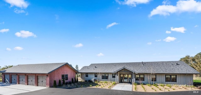 ranch-style home featuring a garage