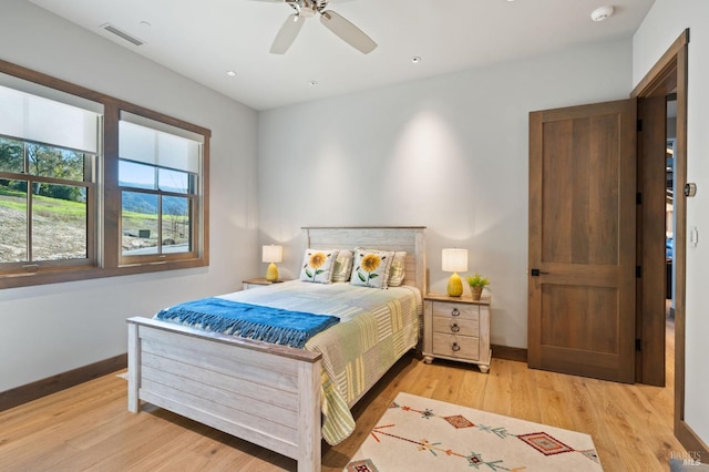 bedroom featuring ceiling fan and light wood-type flooring