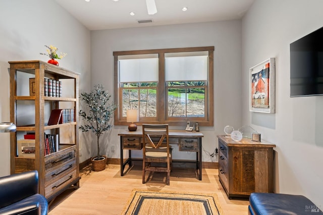 office featuring ceiling fan and light wood-type flooring