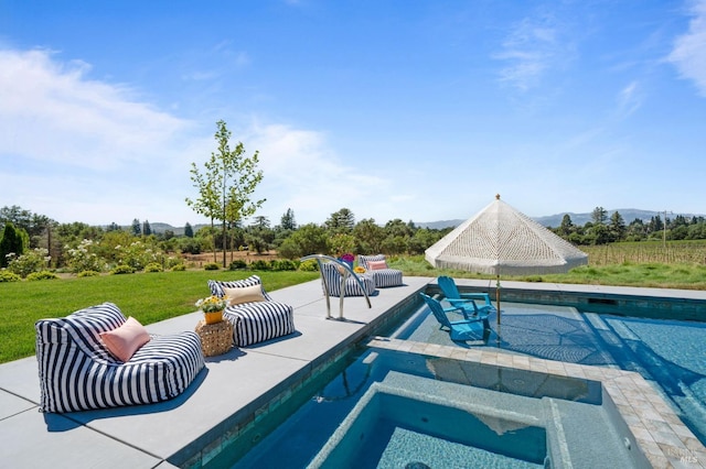 view of swimming pool with a patio and a yard