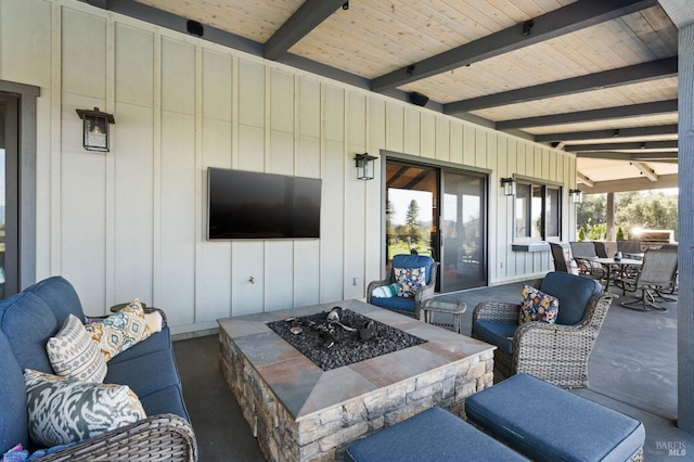 view of patio / terrace featuring a fire pit