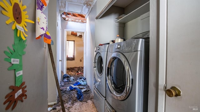 laundry area featuring washer and clothes dryer