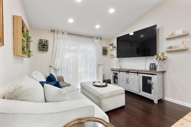 living room featuring dark hardwood / wood-style flooring and vaulted ceiling