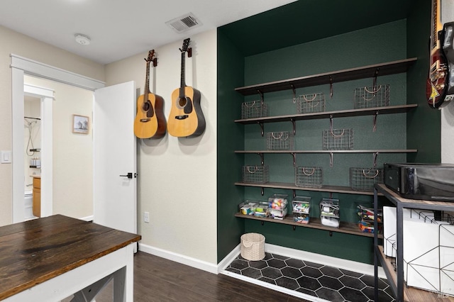 kitchen featuring dark wood-type flooring