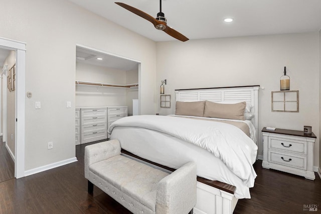 bedroom featuring ceiling fan, dark hardwood / wood-style flooring, and a closet