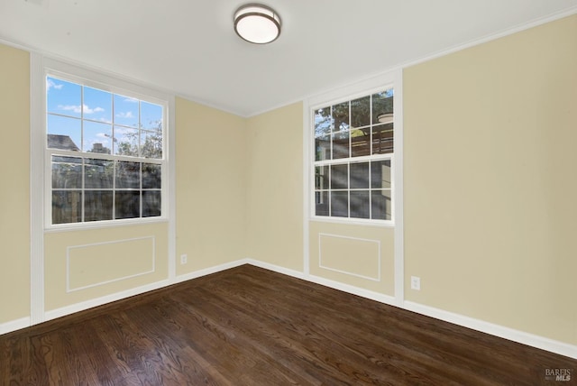 empty room featuring hardwood / wood-style flooring