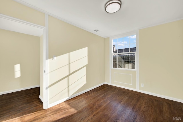 unfurnished room featuring hardwood / wood-style floors