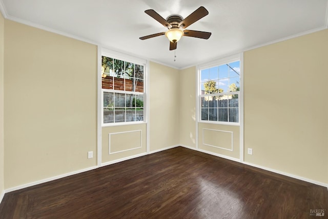 unfurnished room with ornamental molding, dark hardwood / wood-style flooring, and a wealth of natural light