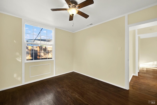 unfurnished room with ornamental molding, ceiling fan, and dark hardwood / wood-style flooring