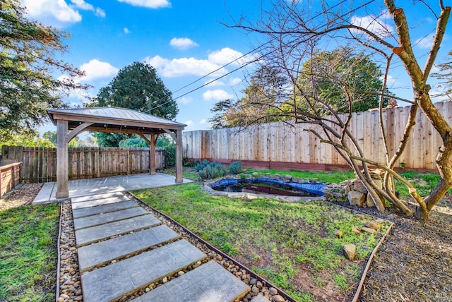 view of yard with a gazebo and a patio