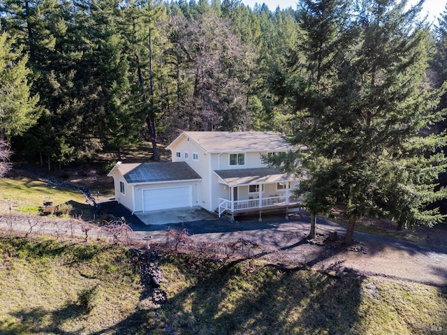 bird's eye view featuring a forest view