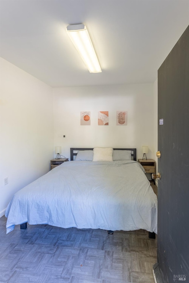 bedroom with baseboards