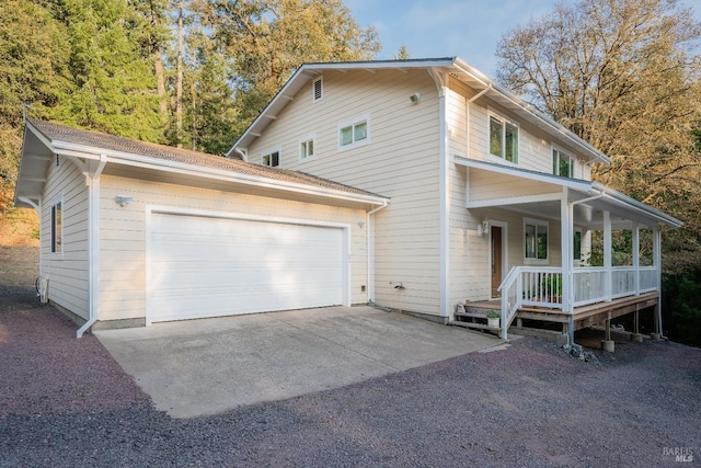 view of front of home featuring driveway and an attached garage