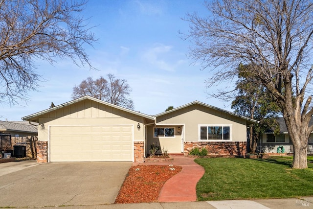 view of front of home featuring a garage and a front yard