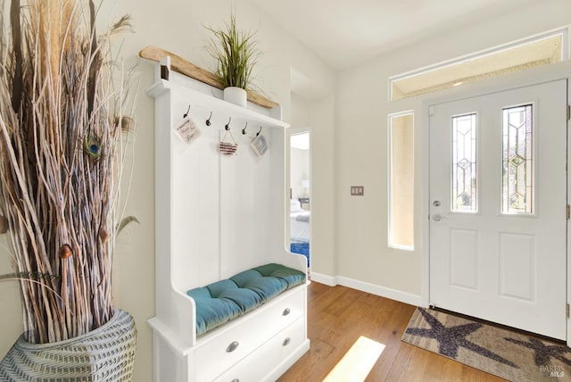 mudroom with light hardwood / wood-style flooring