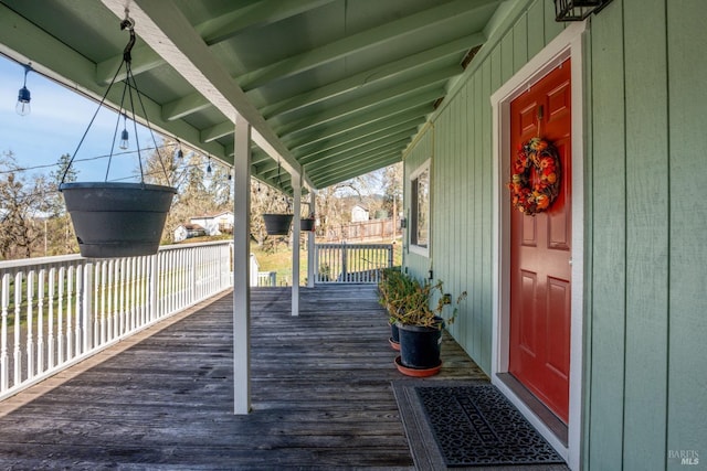 wooden deck featuring a porch