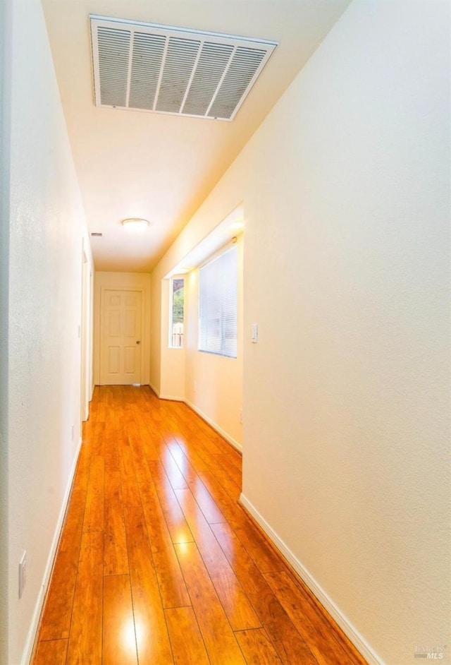 hall featuring hardwood / wood-style floors