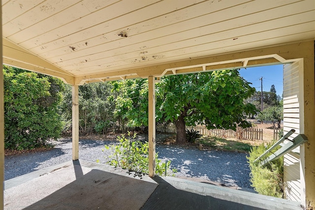 view of patio / terrace featuring fence