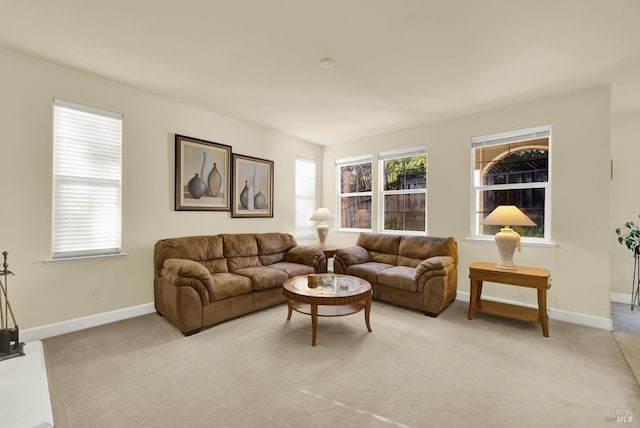 living room featuring light colored carpet