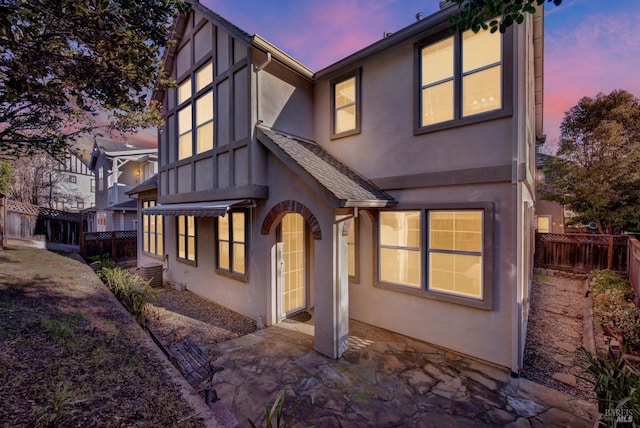 view of front of property featuring a patio area