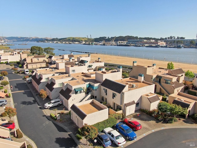 drone / aerial view with a water view