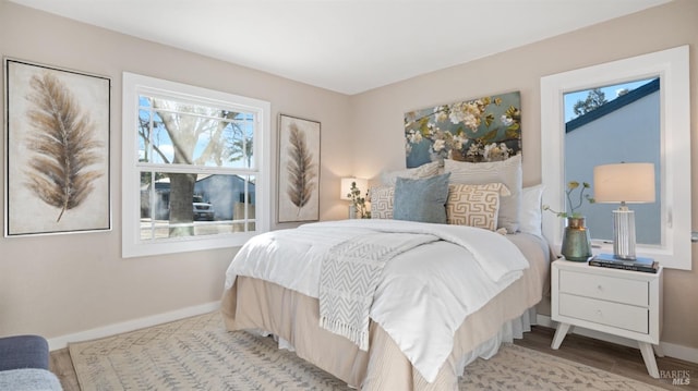 bedroom featuring light wood-type flooring