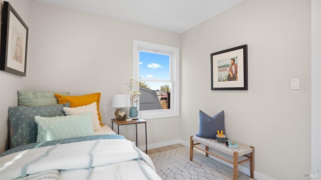 bedroom with light hardwood / wood-style flooring