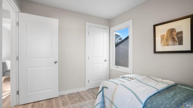 bedroom featuring light wood-type flooring