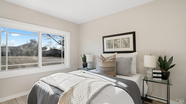 bedroom featuring hardwood / wood-style flooring