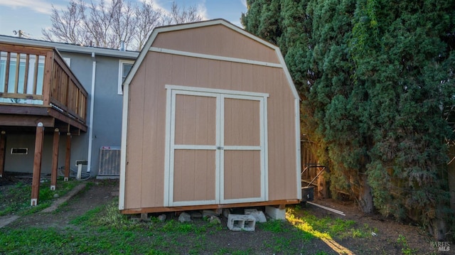 view of outbuilding featuring cooling unit