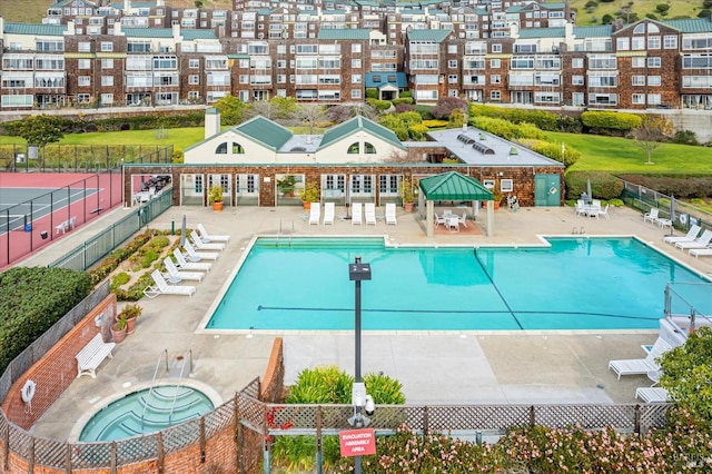 1300 Quarry Ct Unit 213, Richmond, CA 94801 - pool with fence, a community hot tub, and a patio area