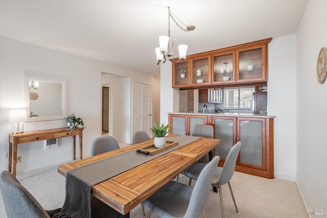 1300 Quarry Ct Unit 213, Richmond, CA 94801 - dining area featuring baseboards and light colored carpet
