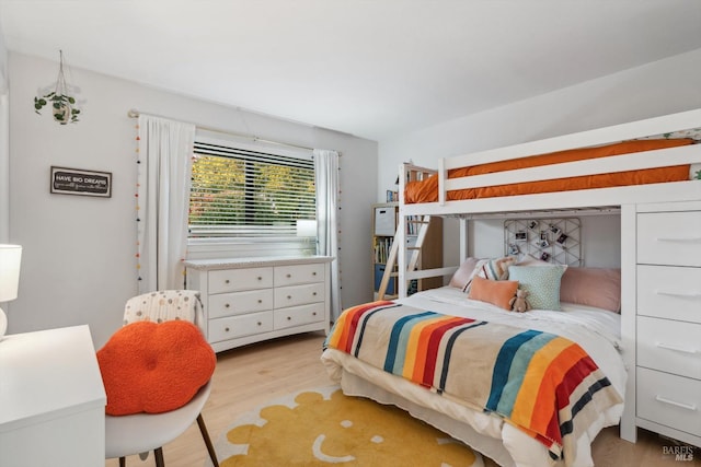 bedroom with light wood-type flooring