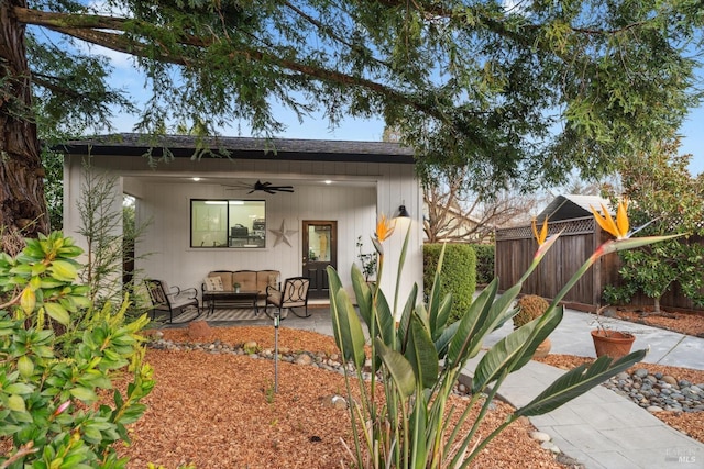 view of front of house with an outdoor hangout area, ceiling fan, and a patio area