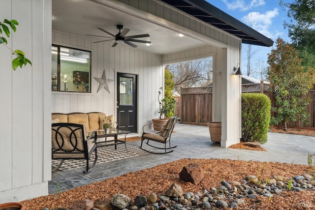 view of patio featuring ceiling fan