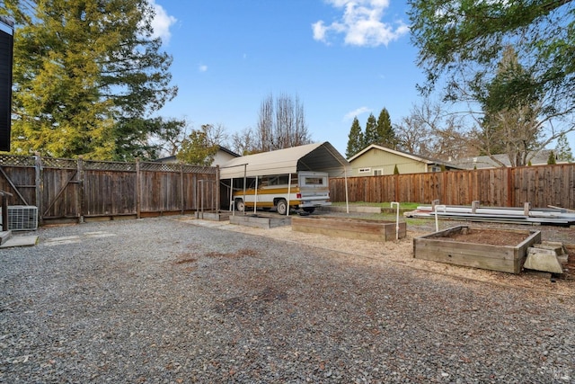 view of yard featuring a carport