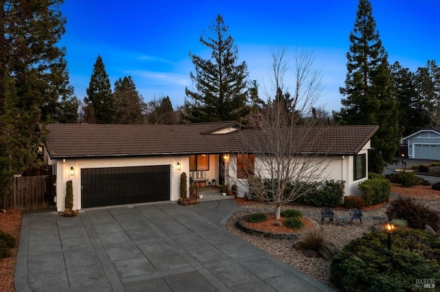 single story home with a garage