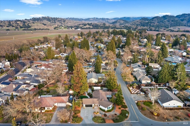 drone / aerial view featuring a mountain view