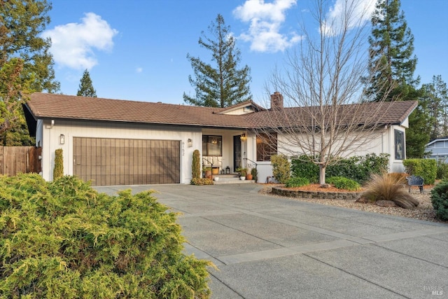 ranch-style home with a garage