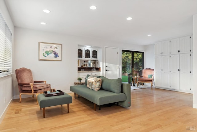 sitting room featuring light wood-type flooring