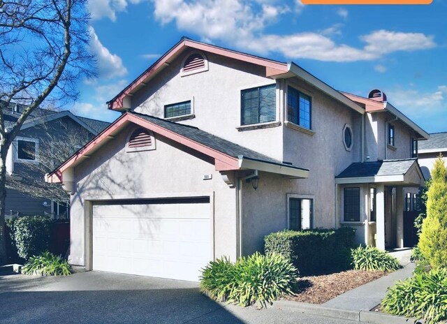 view of front of property with a garage