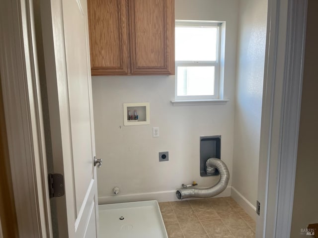 laundry area with cabinets, hookup for a gas dryer, hookup for a washing machine, and electric dryer hookup