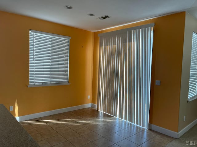 view of tiled spare room