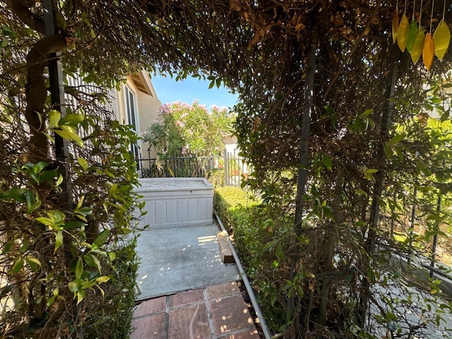 view of patio featuring fence