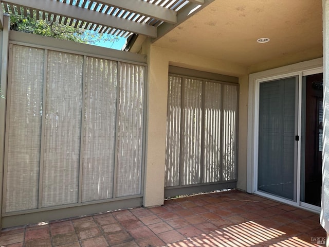 view of patio featuring a pergola