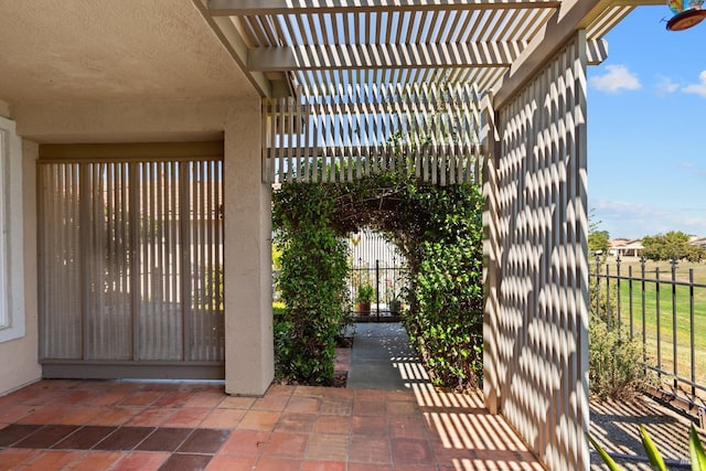 view of patio featuring a pergola